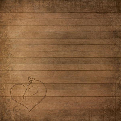 scrapbook paper featuring a brown wood pattern with a heart and horse etched into the bottom corner.