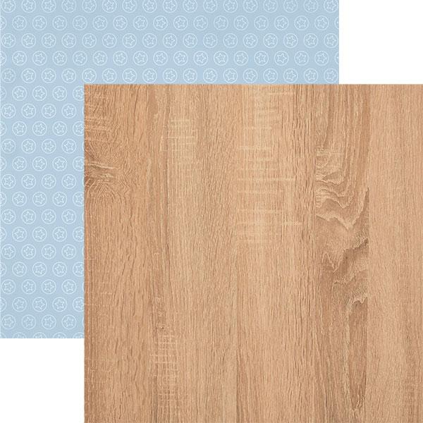 scrapbook paper featuring light brown wood pattern is shown overlapping a pattern of light blue background with white stars in circles.