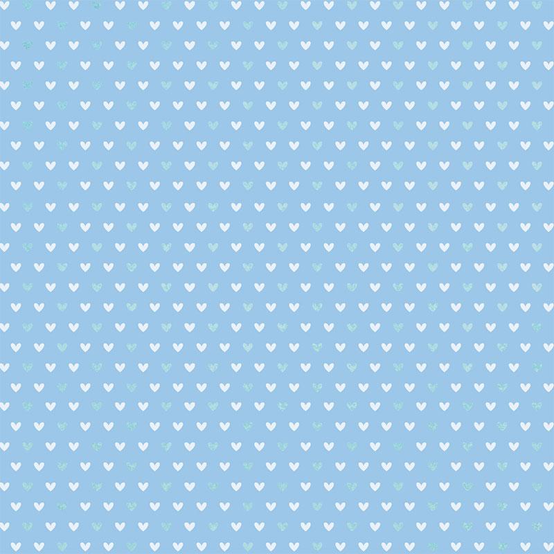 12x12 scrapbook paper featuring a teal and white heart pattern on a blue background.