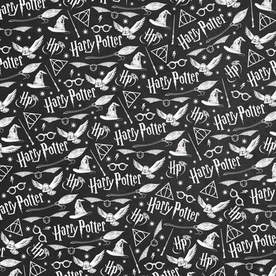 harry potter scrapbook paper featuring white icons, symbols and text on a black background.