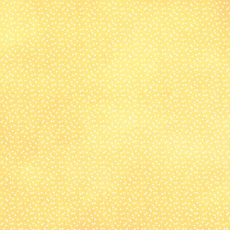 scrapbook paper image features a small white on yellow dot pattern.