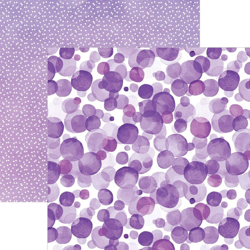 scrapbook paper image features a large purple dot pattern on front side and a small white on purple dot pattern on back side.