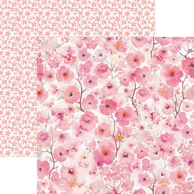 scrapbook paper image features large pink florals on front side and small pink florals on back side.