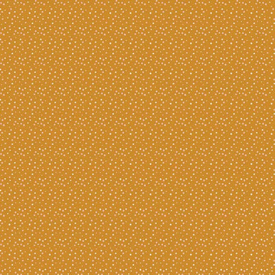 scrapbook paper featuring an orange dotted pattern.