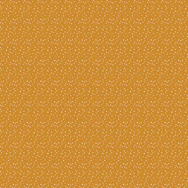 scrapbook paper featuring an orange dotted pattern.