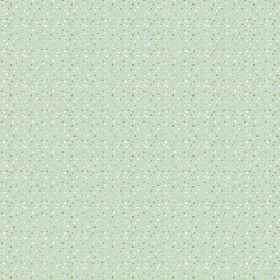 scrapbook paper featuring a pattern of green dots.