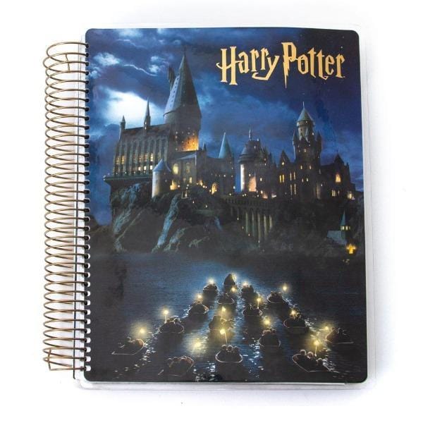 Harry Potter Hogwarts at Night weekly planner image shows cover featuring Hogwarts castle and Harry Potter logo in gold with gold coil spine.