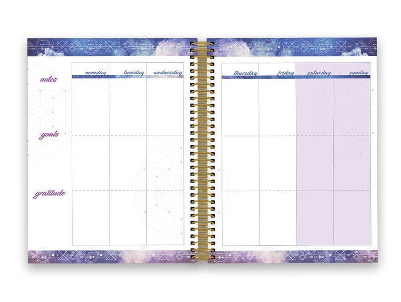 Stargazer weekly planner shown open to a weekly spread featuring blue borders.