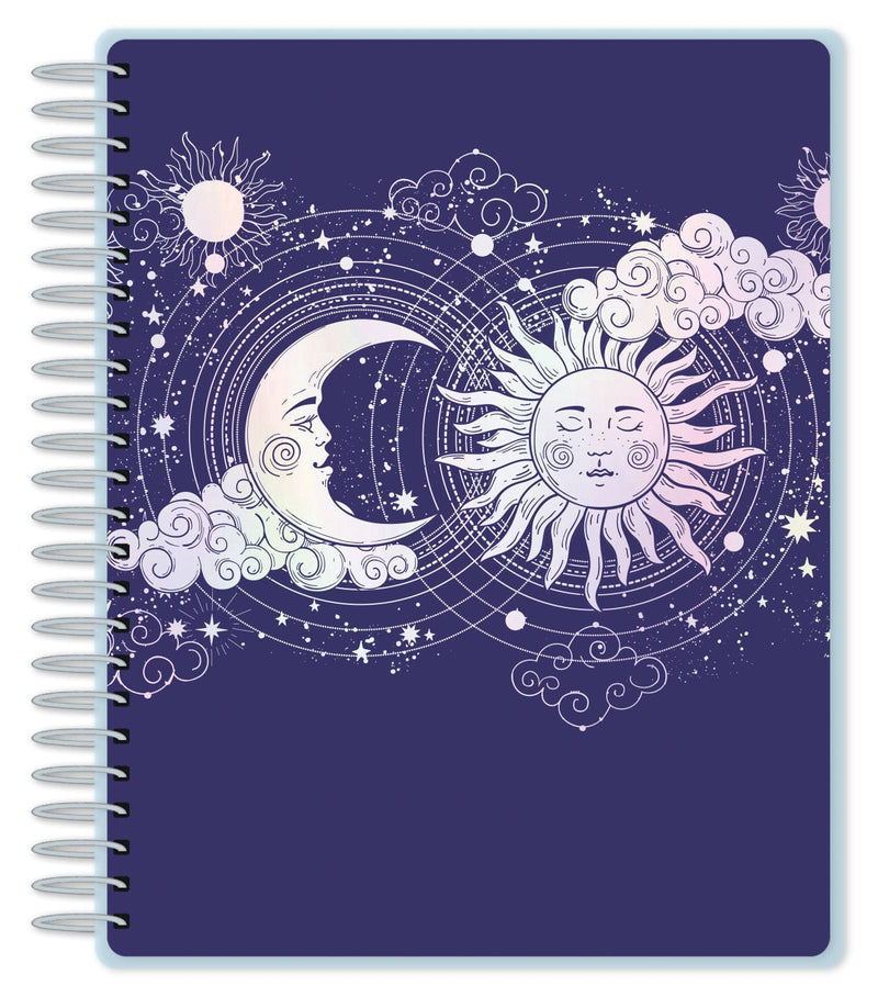 weekly planner cover  featuring an illustration of the sun and moon in holographic foil on dark blue background with silver spiral spine.