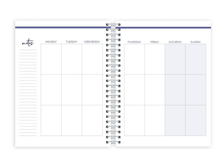 weekly planner featuring weekly spread with silver coil spine, shown on white background.