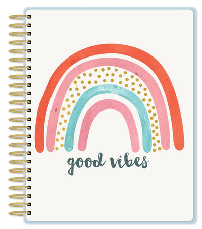 Good vibes weekly planner featuring an illustrated rainbow with gold details and gold coil spine, shown on white background.