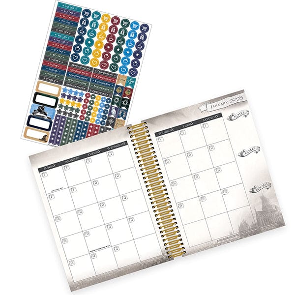 Harry Potter weekly planner shown open to a monthly spread. Coordinating planner stickers are shown in the background.