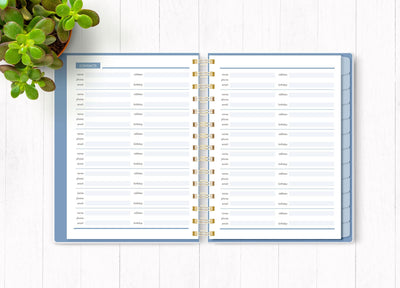 Wild and Free planner organizer image shown open to an inside spread featuring contacts.
