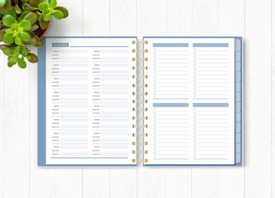 Wild and Free planner organizer image shown open to an inside spread featuring passwords.