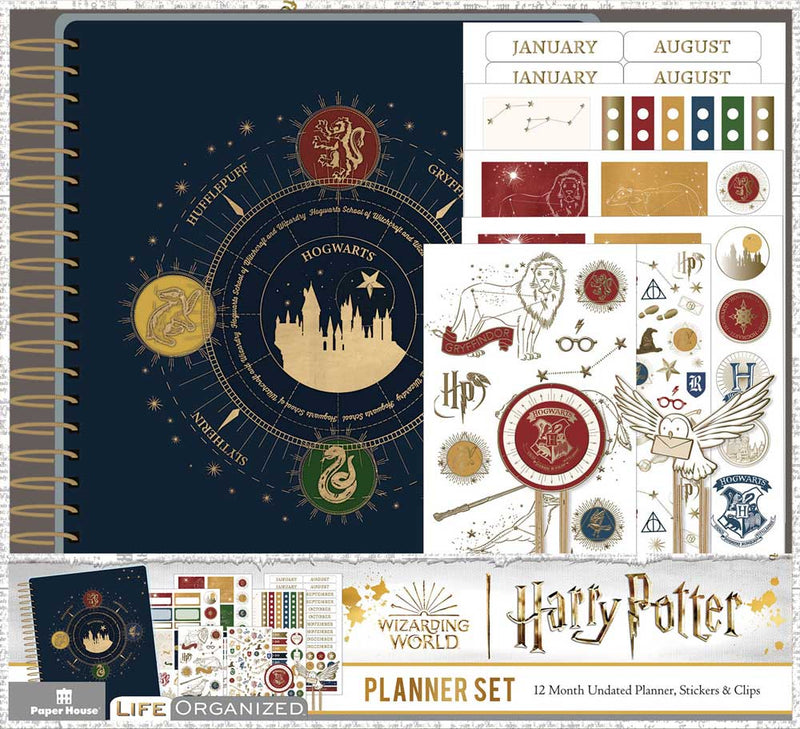 Harry Potter planner set featuring a navy planner with constellations in gold details plus sheets of stickers, shown in package.