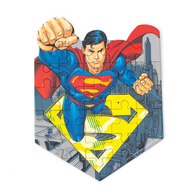mini die cut jigsaw puzzle featuring superman, shown on white background.