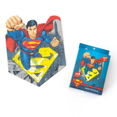 mini die cut jigsaw puzzle featuring superman, shown with package on white background.