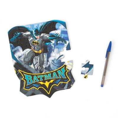 mini diecut jigsaw puzzle featuring batman, shown with pen and single piece removed on white background.