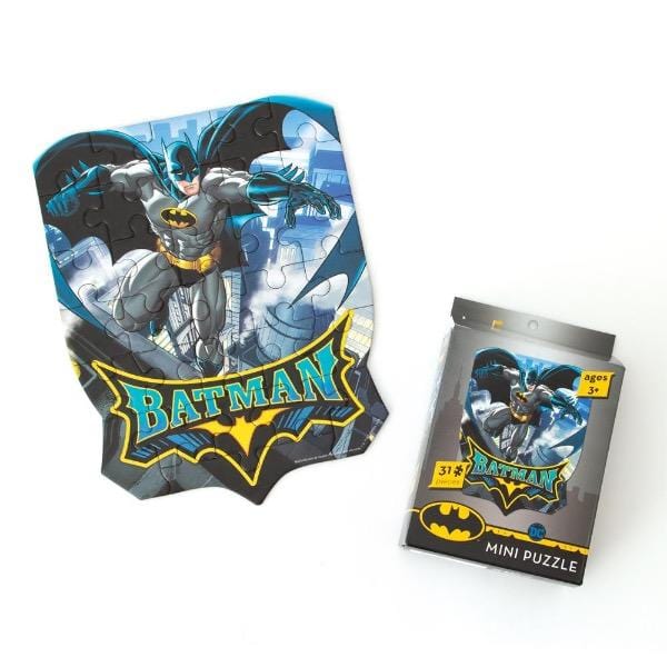 mini die cut jigsaw puzzle featuring Batman, shown assemble and with box on white background.