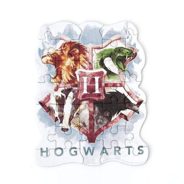 die cut mini jigsaw puzzle featuring Harry Potter™ Hogwarts crest, shown on white background.