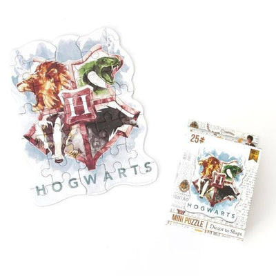 die cut mini jigsaw puzzle featuring Harry Potter™ Hogwarts crest with package, shown on white background.