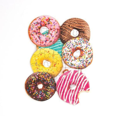 die cut mini jigsaw puzzle featuring photo real donuts, shown on white background.