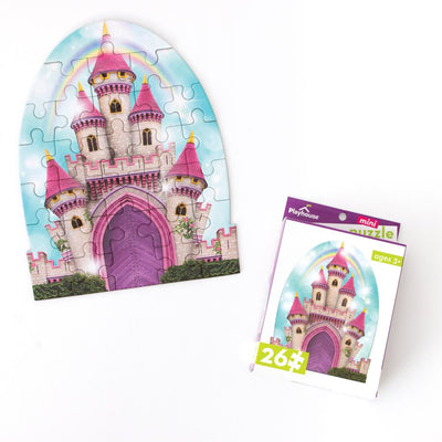 die cut mini jigsaw puzzle featuring an illustrated pink castle with rainbow shown with package on white background.