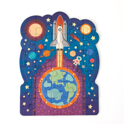 mini die cut jigsaw puzzle featuring an illustrated rocket ship with planets, shown on white background.
