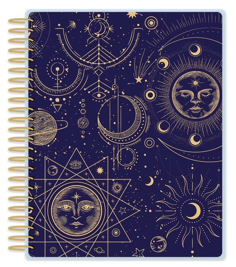 undated planner featuring a blue celestial background with gold details and a gold coiled spine shown on a white background.