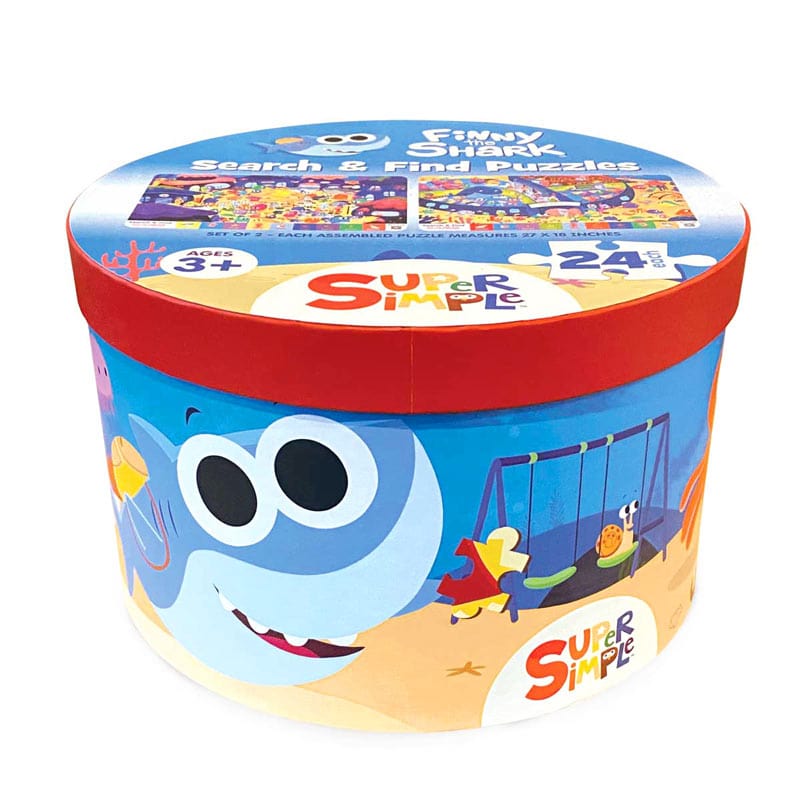 Floor Puzzle Set shown in round box featuring finny the shark, shown on white background.