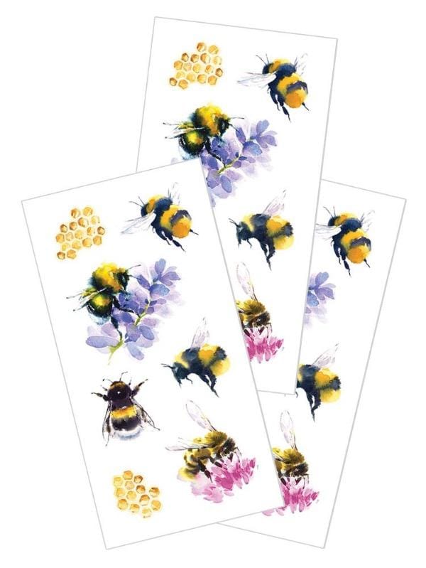 3 sheets of overlapping decorative stickers featuring bees, florals and honeycombs shown on a white background.