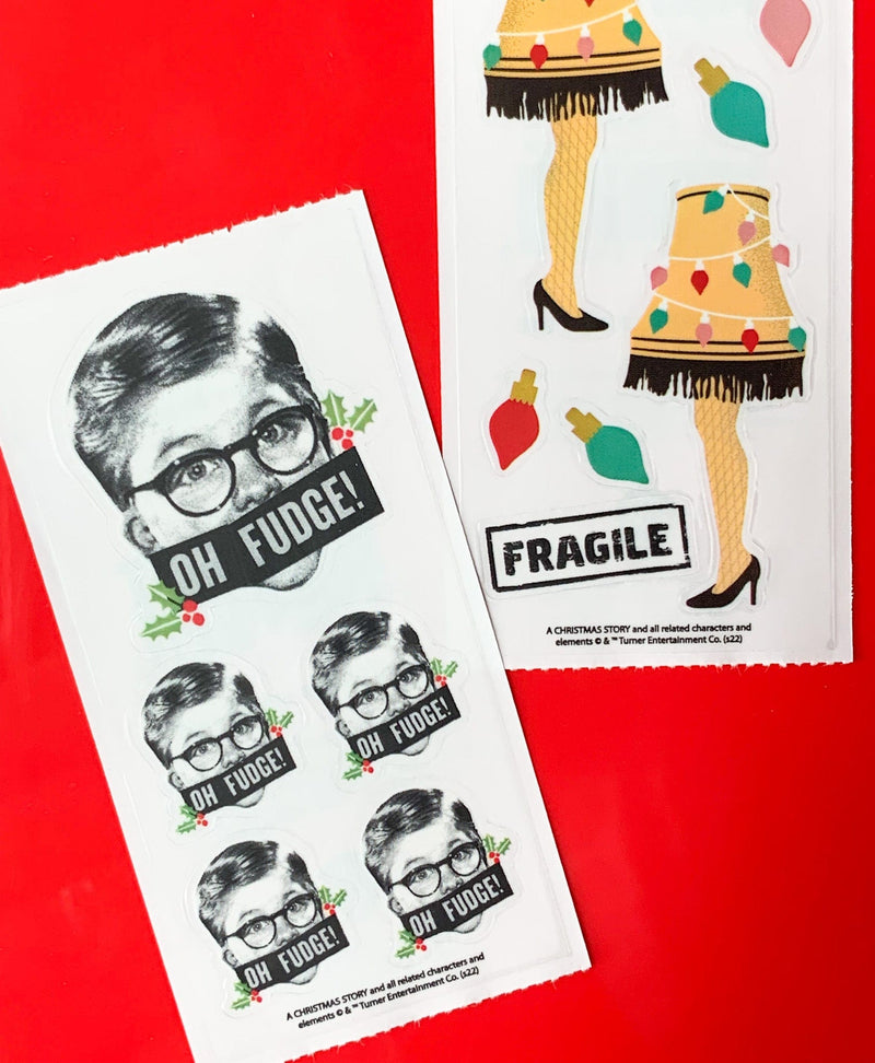 One sheet each of Oh Fudge stickers and Leg Lamp stickers set against a red background