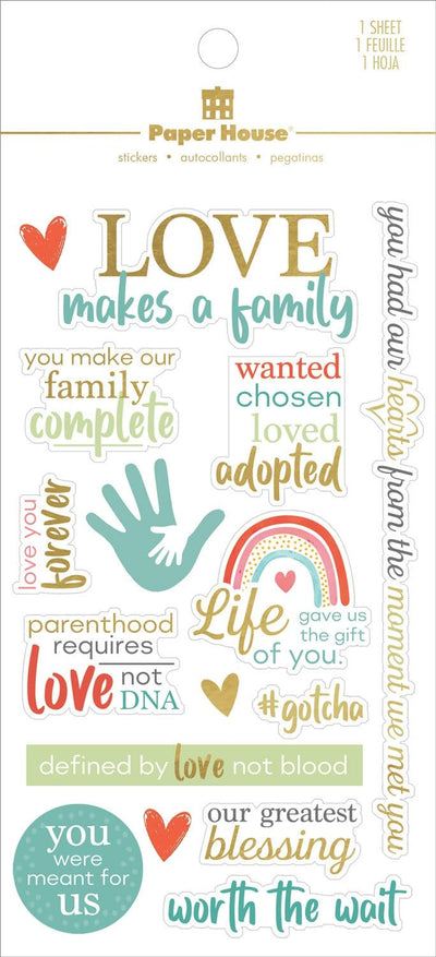 scrapbook stickers shown in packaging, featuring adoption themed sentiments with gold, teal and red details.