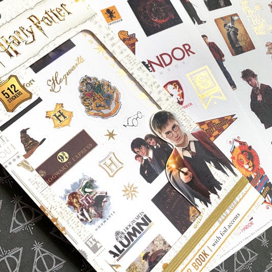 Harry Potter themed planner stickers are shown in packaging featuring Harry, Ron, Hermione, illustrated crests and colorful icons. 