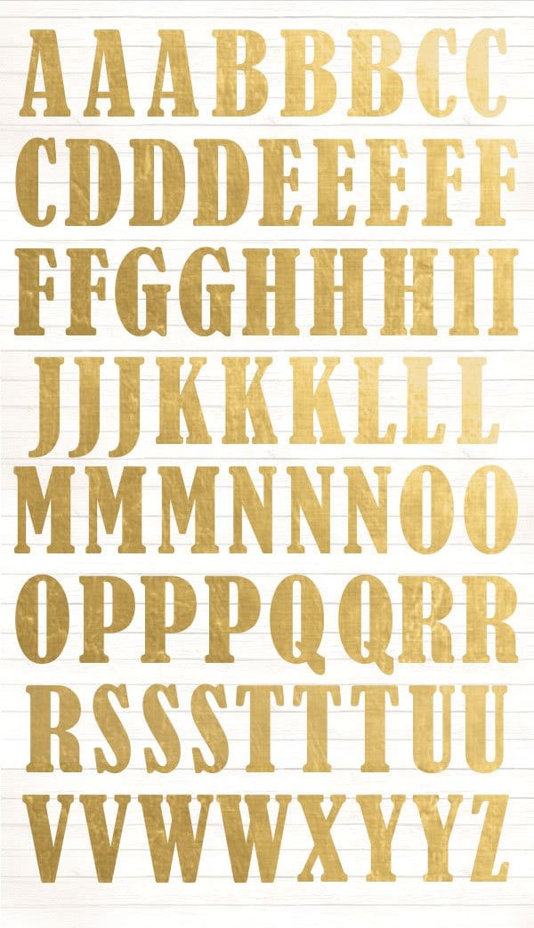scrapbook stickers featuring a gold alphabet.