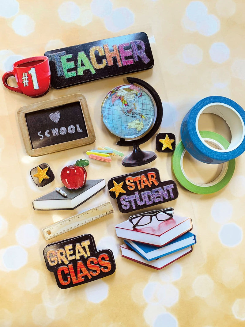 3D scrapbook stickers featuring colorful chalkboard art with the world globe shown next to 2 rolls of washi tape on a yellow bokeh background.