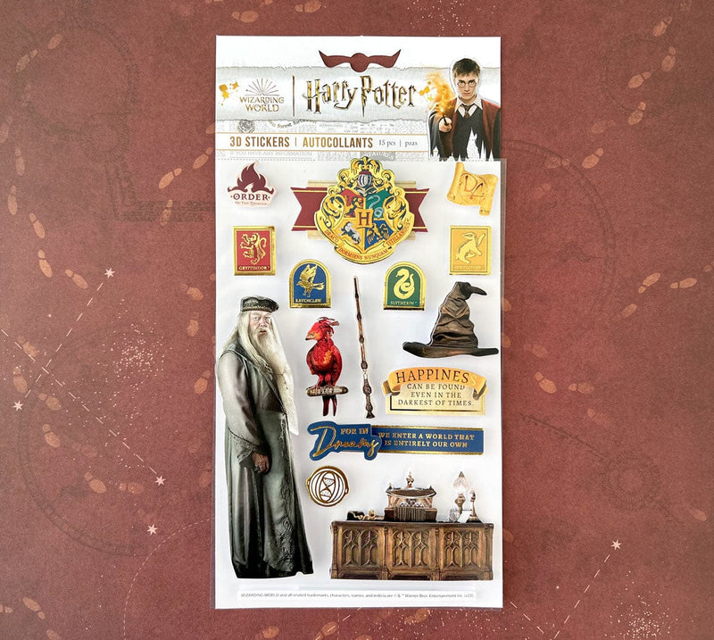 Harry Potter stickers featuring Dumbledore and house crests, shown in package on dark red background.