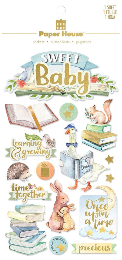 An assortment of baby themed scrapbook stickers featuring bunny illustrations and sentiments in bues and golds.
