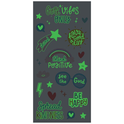 glow in the dark stickers featuring hearts, rainbows and good vibe sentiments in green on dark gray, shown on white background.