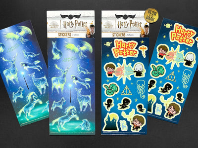 Two Harry Potter stickers shown in package featuring the Patronus Charms and Chibi Characters shown glowing with 2 more sheets displayed on black background.