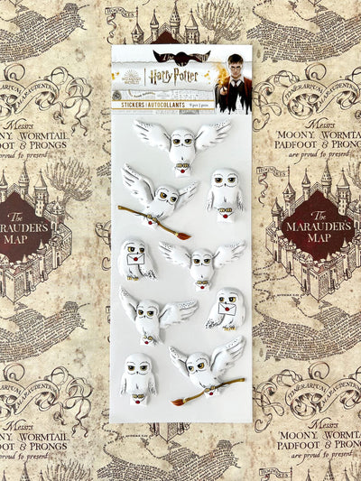Harry Potter stickers featuring multiple Hedwigs shown in packaging on Marauder's Map pattern.