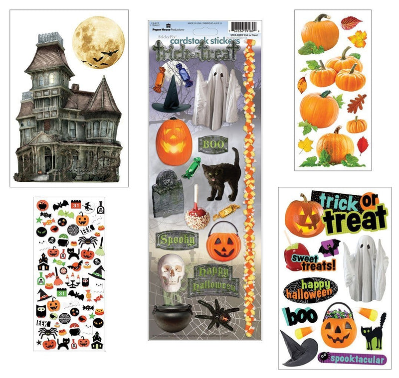 An assortment of scrapbook stickers featuring pumpkins, haunted house and trick or treat with glitter and foil details shown displayed on a white background.