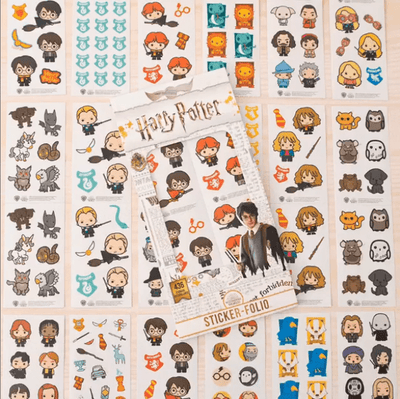 Harry Potter sticker book featuring chibi characters is shown above an assortment of Harry Potter chibi sticker sheets.