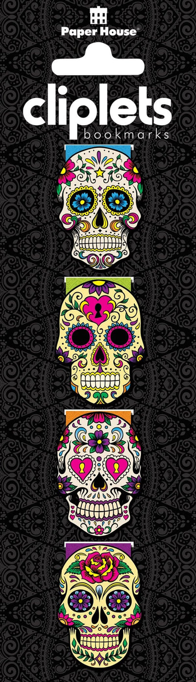 4 magnetic bookmarks featuring colorful, illustrated sugar skulls in a black and gray patterned package.