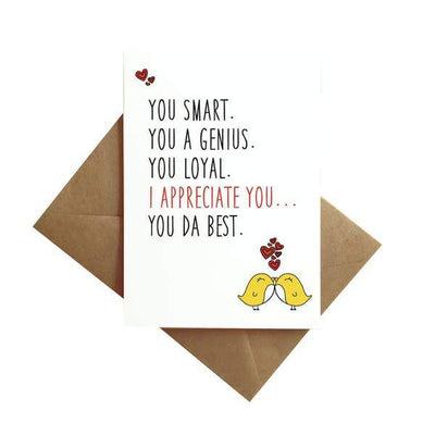 note card featuring illustrated love birds with inspirational black text, shown with brown envelope on white background.