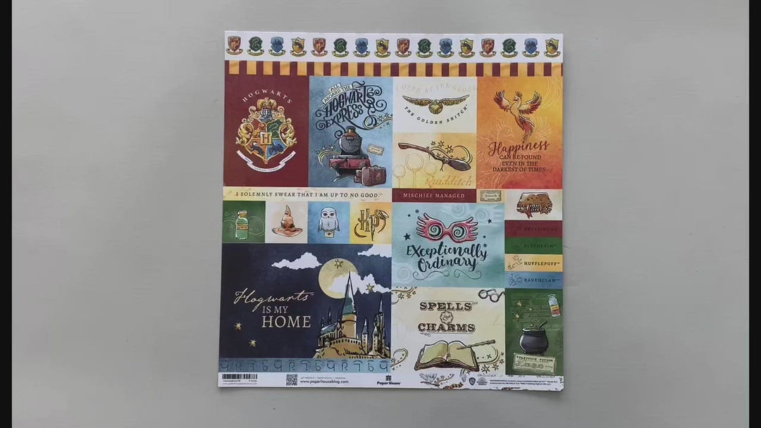 female hands pick up and show both sides of harry potter scrapbook paper featuring watercolor tags.