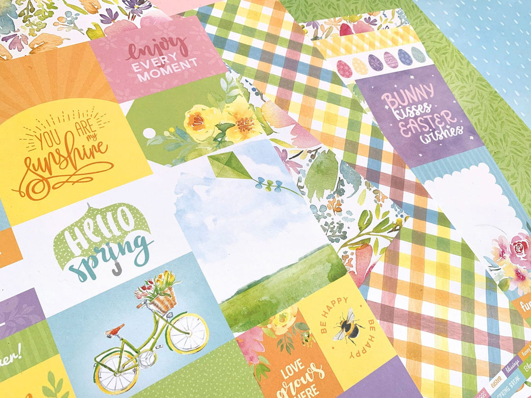 this craft kit image features close up of spring themed scrapbook papers shown on an angle.