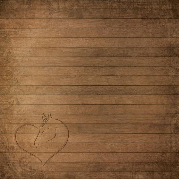scrapbook paper featuring a brown wood pattern with a heart and horse etched into the bottom corner.