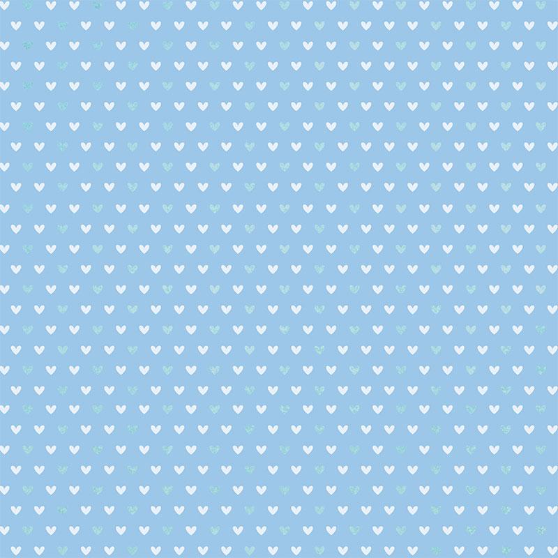 12x12 scrapbook paper featuring a teal and white heart pattern on a blue background.