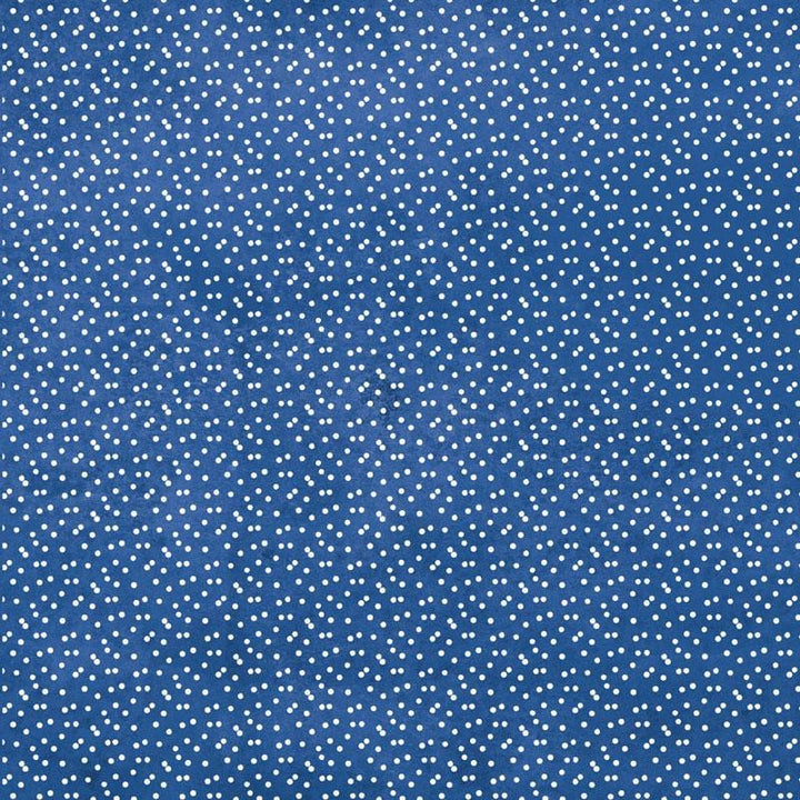 scrapbook paper image features a small white on blue dot pattern.